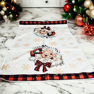 Festive hand towel with "Merry Christmas" and Santa Claus image
Holiday kitchen towel featuring gold snowflakes and vintage Santa
Vintage Santa Claus dish towel with red and black gingham trim