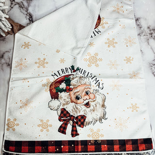 Rustic Christmas hand towel with vintage Santa and gold snowflakes
Vintage Santa Claus kitchen towel with Merry Christmas text
Christmas hand towel with traditional Santa design and gingham accents