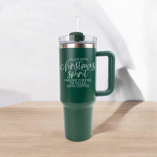 dark green tumbler with straw
green tumbler 2024